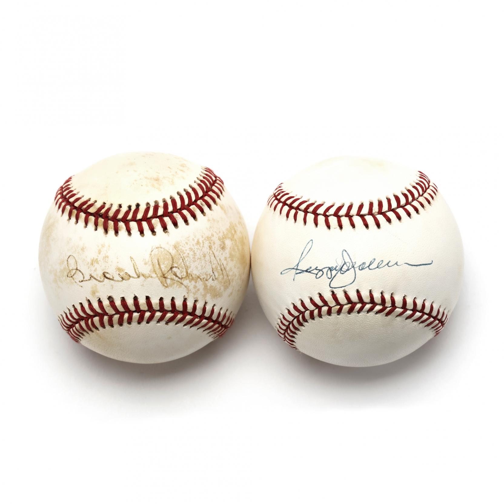two-autographed-baseballs-brooks-robinson-and-reggie-jackson