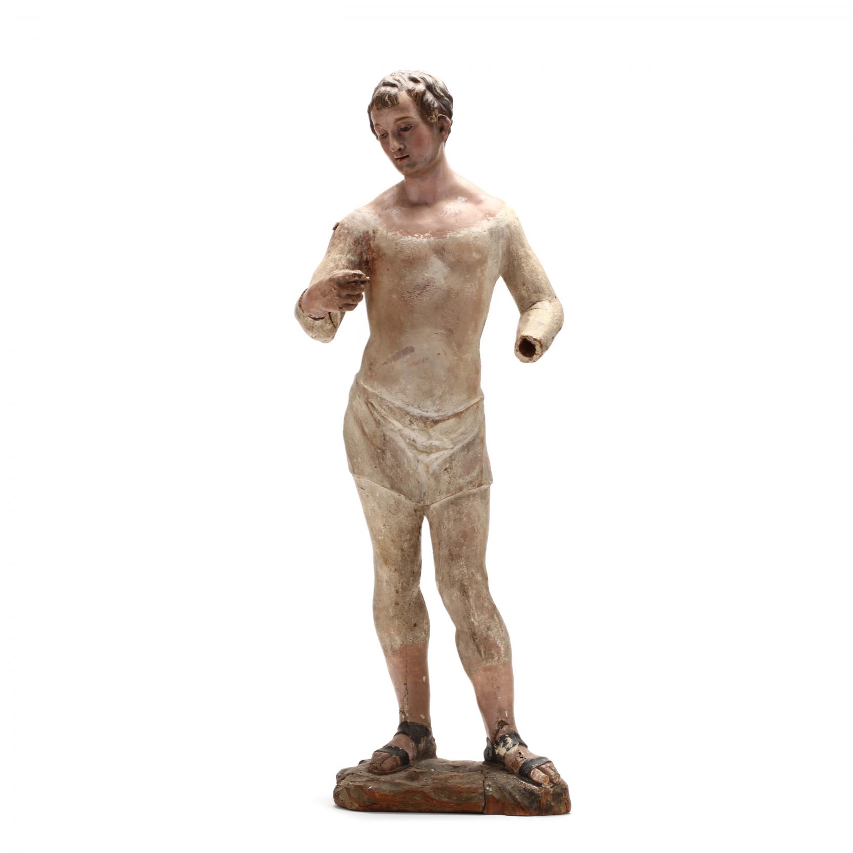 an-italian-carved-and-polychrome-figure-of-a-male-saint