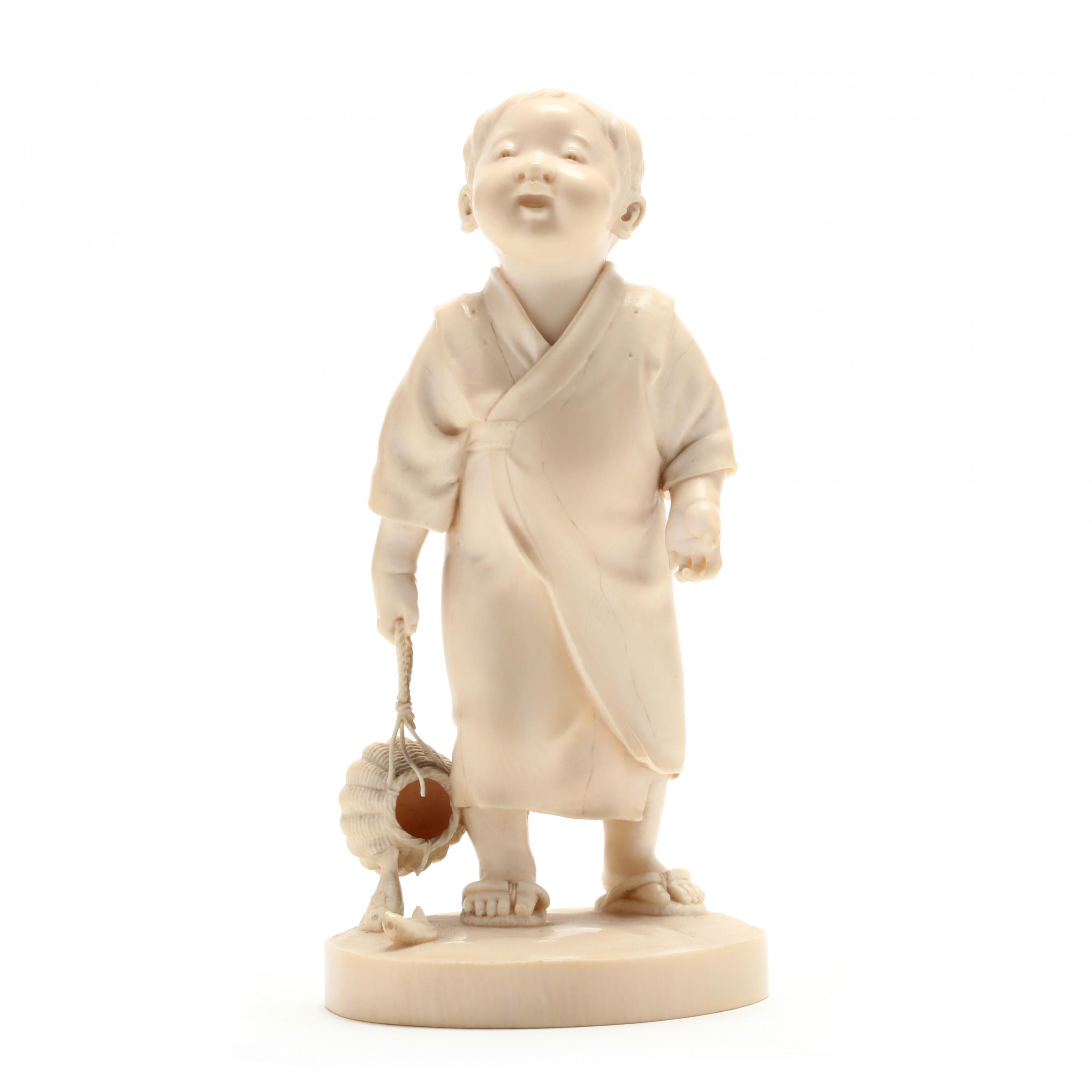 japanese-carved-ivory-okimono-of-a-boy